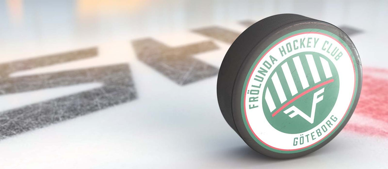 Puck med SHL-laget Frölundas logga