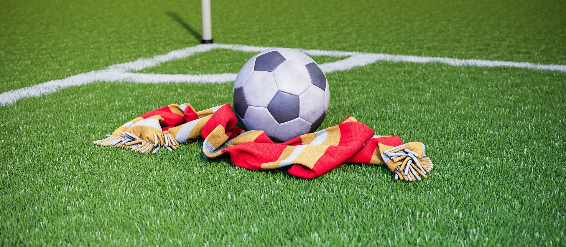 Bild på en fotboll och en supporterhalsduk med allsvenska laget Kalmars färger