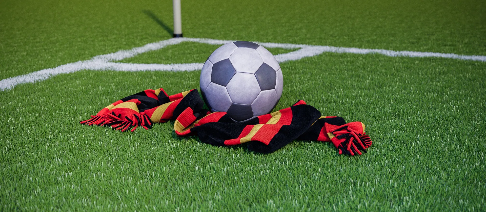  Bild på en fotboll och en supporterhalsduk med allsvenska laget Brommapojkarnas färger