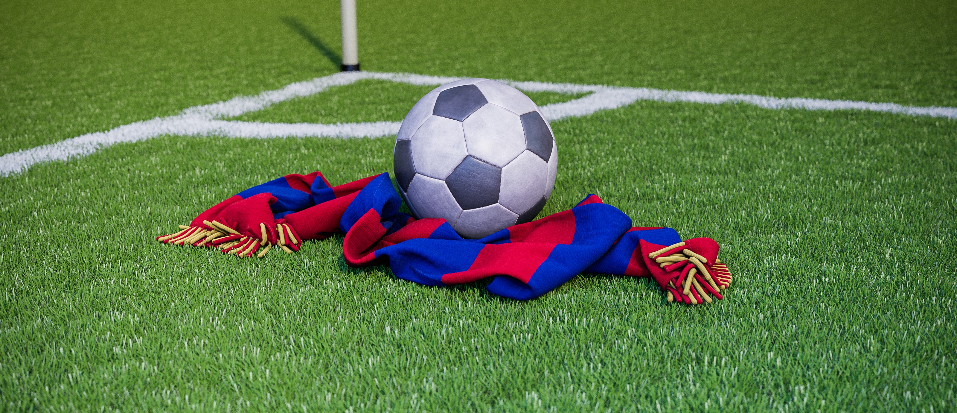 Bild på en fotboll och en supporterhalsduk med allsvenska laget Örgryte IS färger