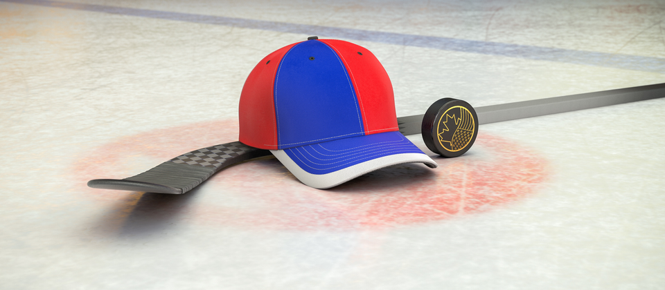 Bild på hockeyklubba, puck och en supporterkeps med NHL-laget Montreal Canadiens färger