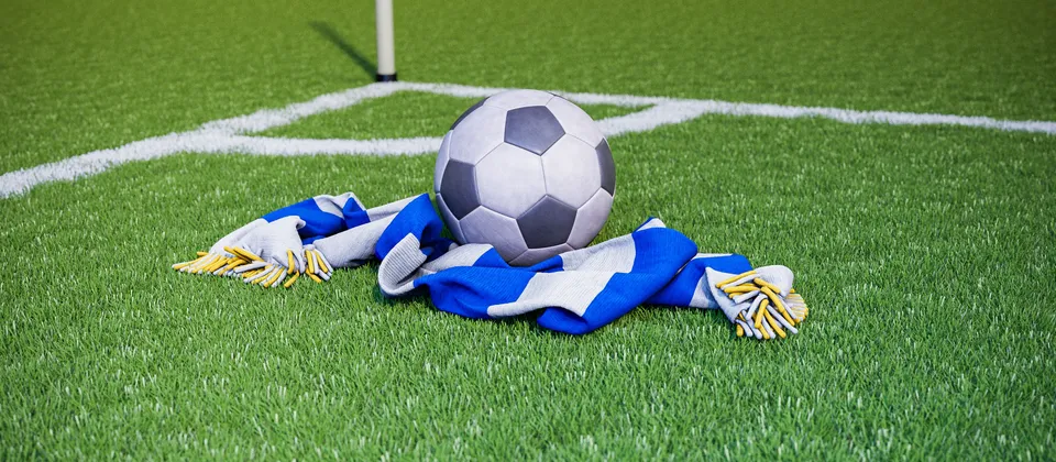 Bild på en fotboll och en supporterhalsduk med Allsvenska laget Göteborgs färger
