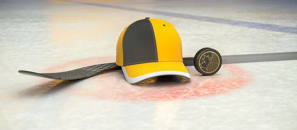 Bild på hockeyklubba, puck och en supporterkeps med NHL-laget Pittsburgh Penguins färger