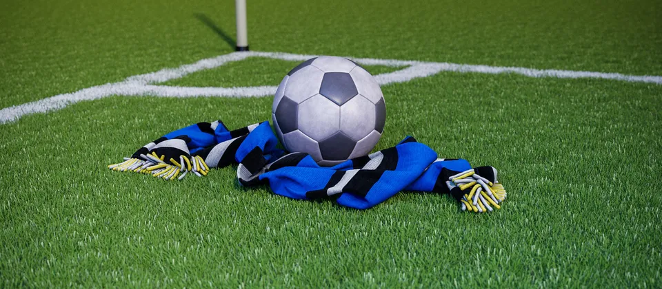 Bild på en fotboll och en supporterhalsduk med allsvenska laget Sirius färger