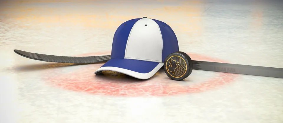 Bild på hockeyklubba, puck och en supporterkeps med NHL-laget Tampa Bay Lightnings färger