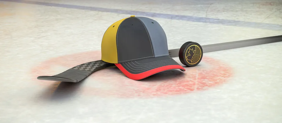 Bild på hockeyklubba, puck och en supporterkeps med NHL-laget Vegas Golden Knights färger