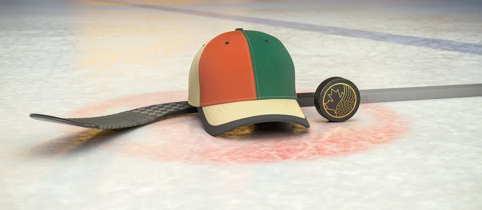 Bild på hockeyklubba, puck och en supporterkeps med NHL-laget Arizona Coyotes färger