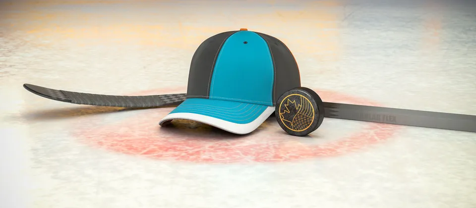 Bild på hockeyklubba, puck och en supporterkeps med NHL-laget San Jose Sharks färger