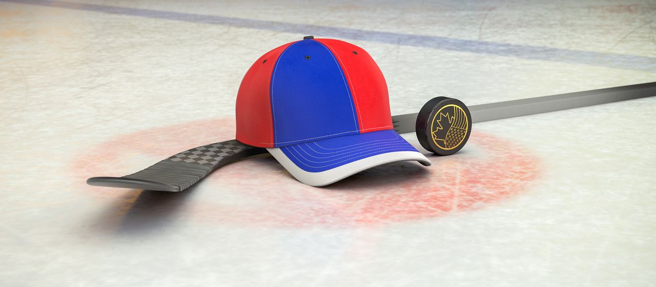Bild på hockeyklubba, puck och en supporterkeps med NHL-laget Montreal Canadiens färger